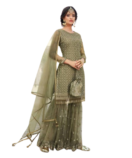 lady wearing green color sharara suit
