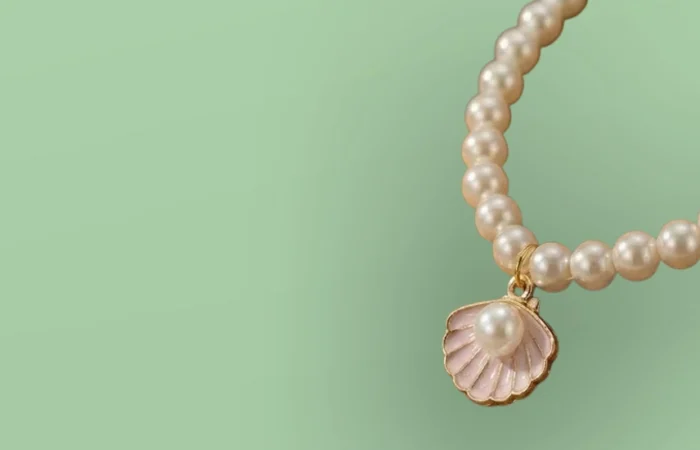 image contain imitation pearl jewellery