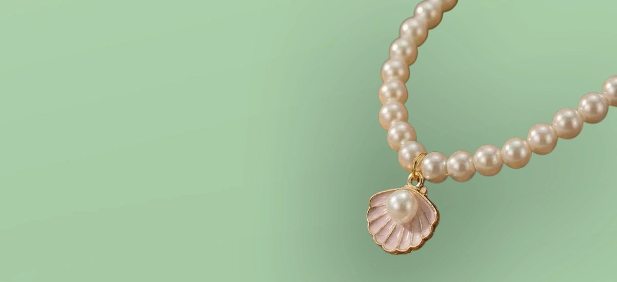 image contain imitation pearl jewellery